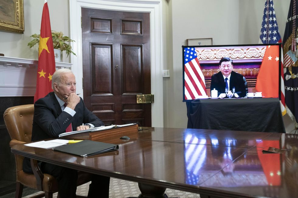 Photo of U.S. President Joe Biden and Chinese Preside Xi Jinping during a video call at the White House