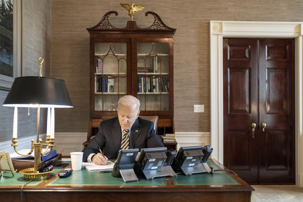 Photo of U.S. president Joe Biden on a call with Ukrainian president Volodymyr Zelensky