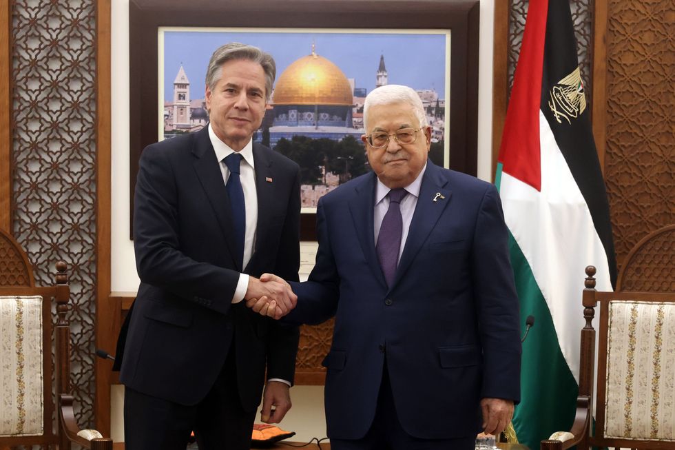 Photo of U.S. Secretary of State and Palestinian President Mahmoud Abbas