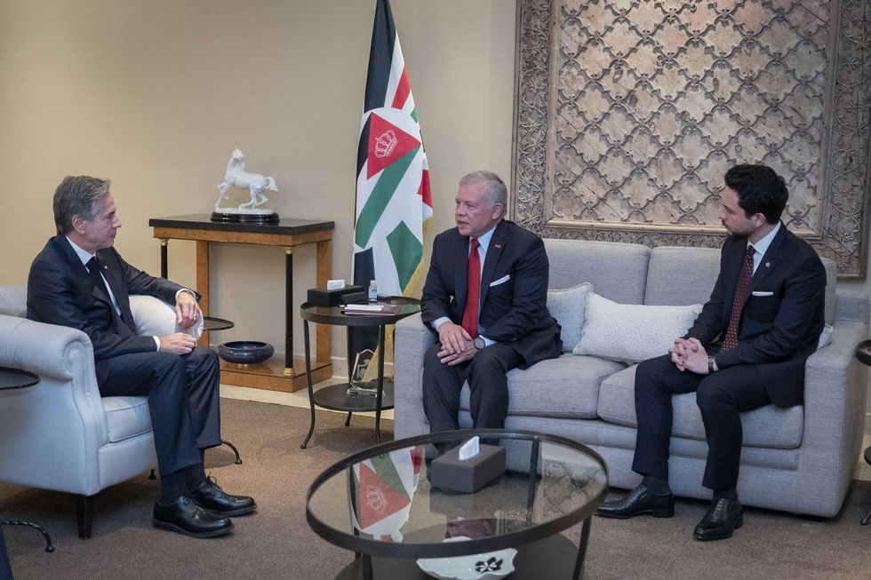 Photo of U.S Secretary of State Antony Blinken, left, King Abdullah II of Jordan, center, and Crown Prince Al Hussein, right, during discussion with Arab leaders on humanitarian assistance for civilians in Gaza on Nov. 4 in Amman, Jordan.