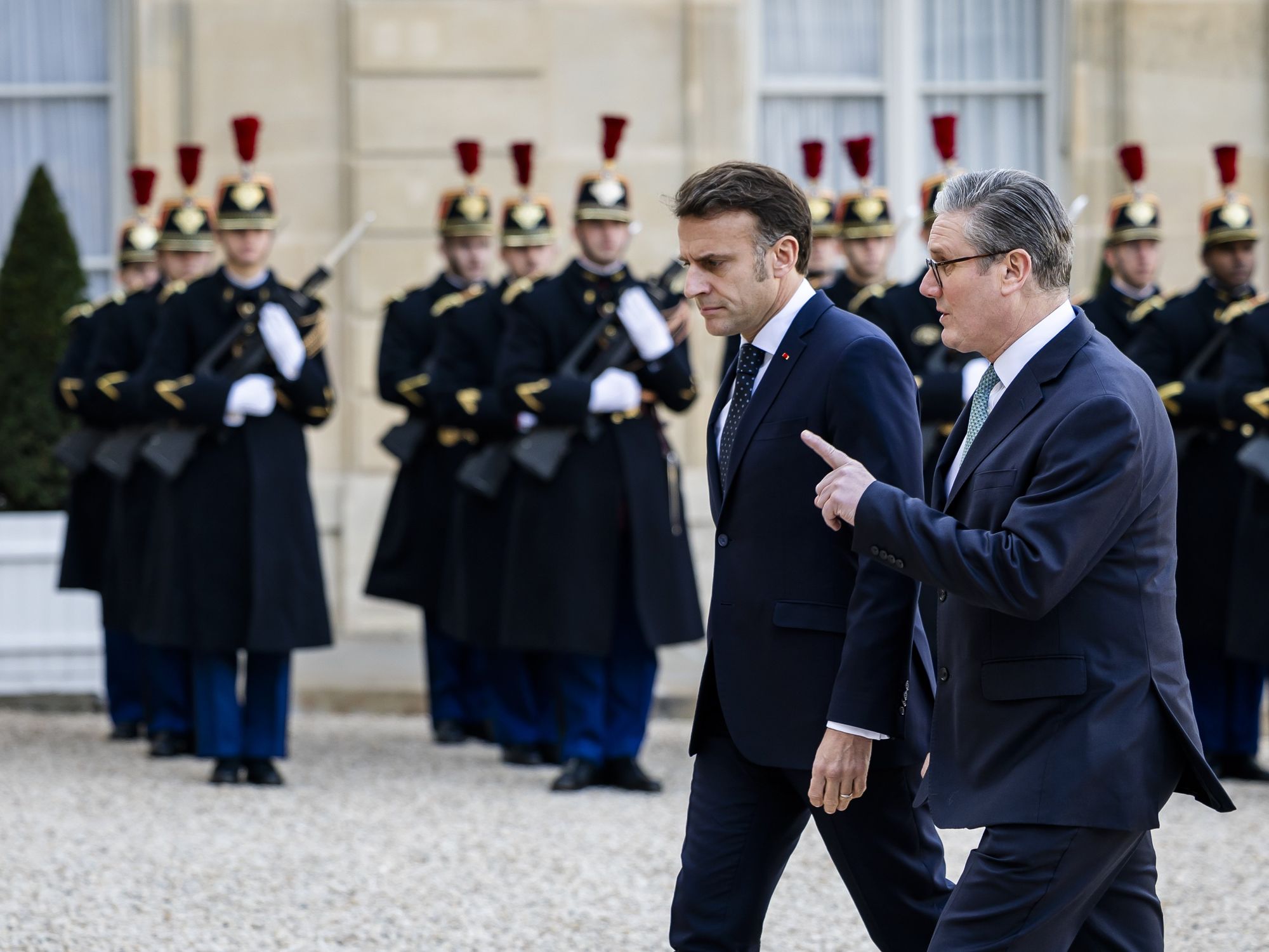 photo of UK Prime Minister Keir Starmer is received Monday by French President Emmanuel Macron ahead of an emergency meeting in Paris.
