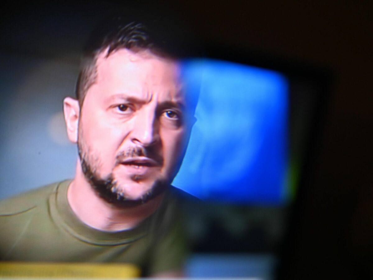 Photo of Ukrainian President Volodymyr Zelensky delivering a speech