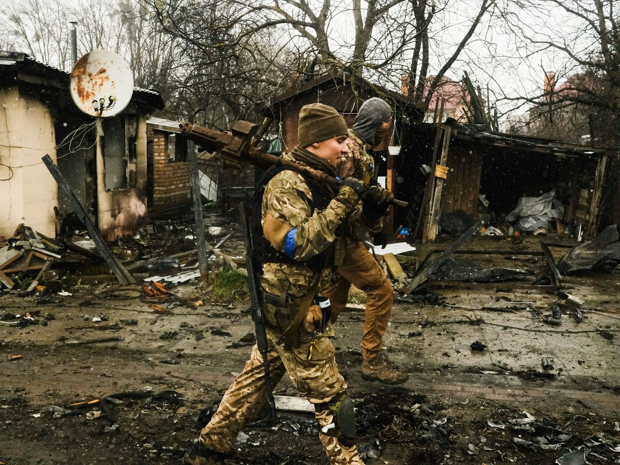 Photo of Ukrainian soldiers arriving in Bucha on Sunday