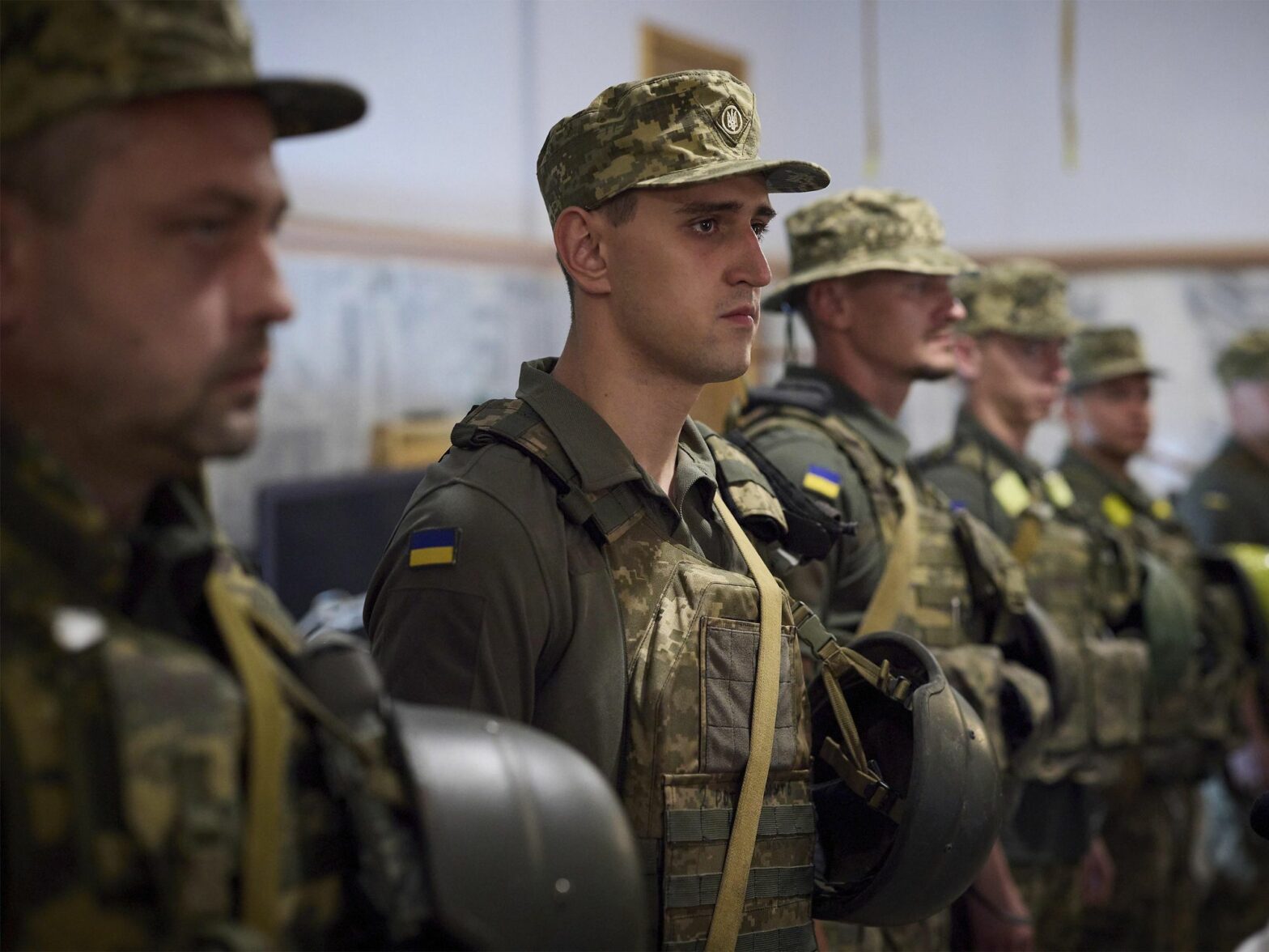 Photo of Ukrainian soldiers standing during a presentation of medals by President Volodymyr Zelensky on the frontlines in the Dnipropetrovsk region