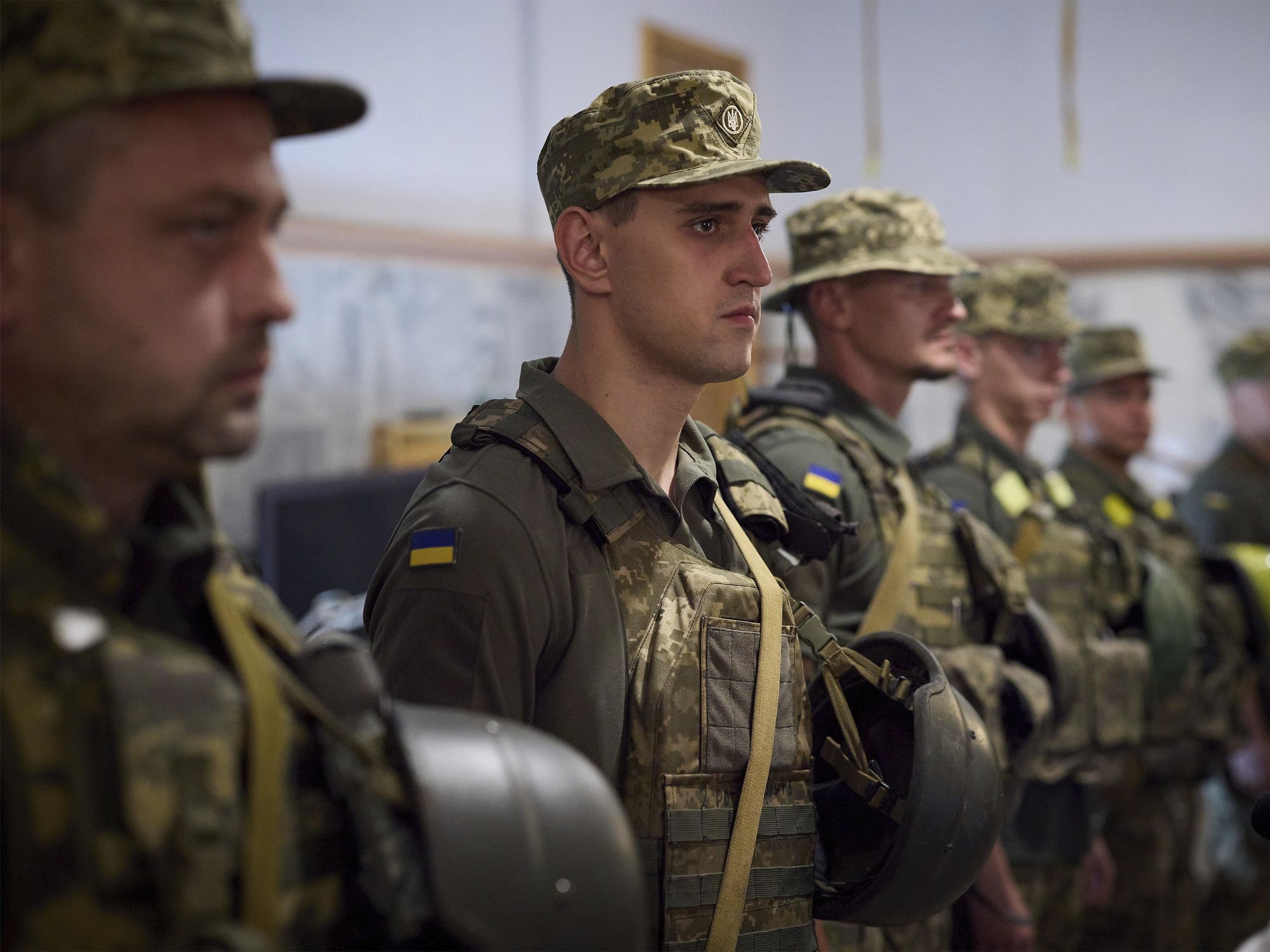 Photo of Ukrainian soldiers standing during a presentation of medals by President Volodymyr Zelensky on the frontlines in the Dnipropetrovsk region