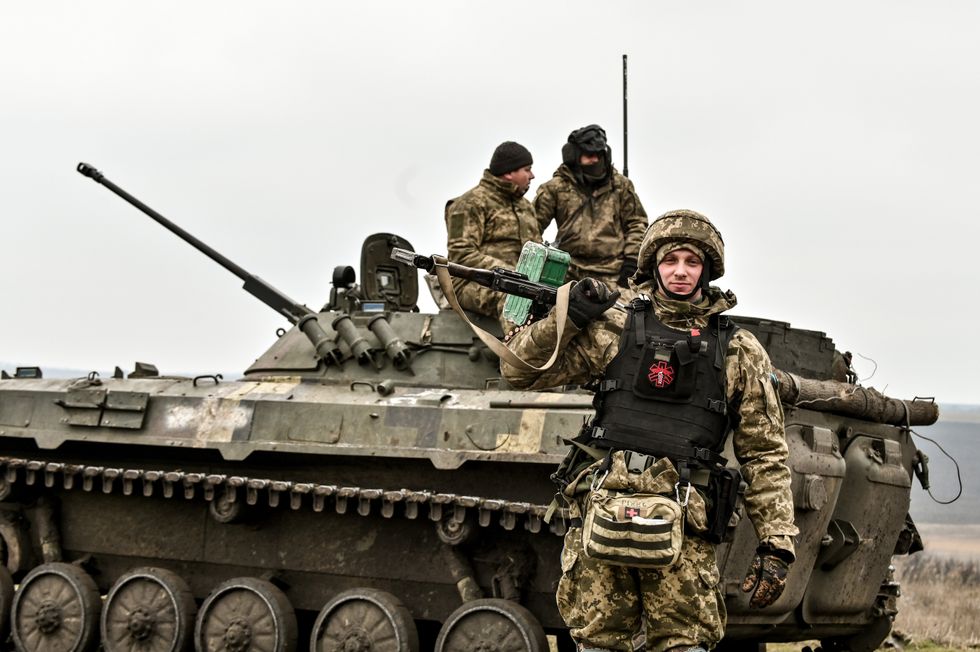 Photo of Ukrainian soldiers with a tank