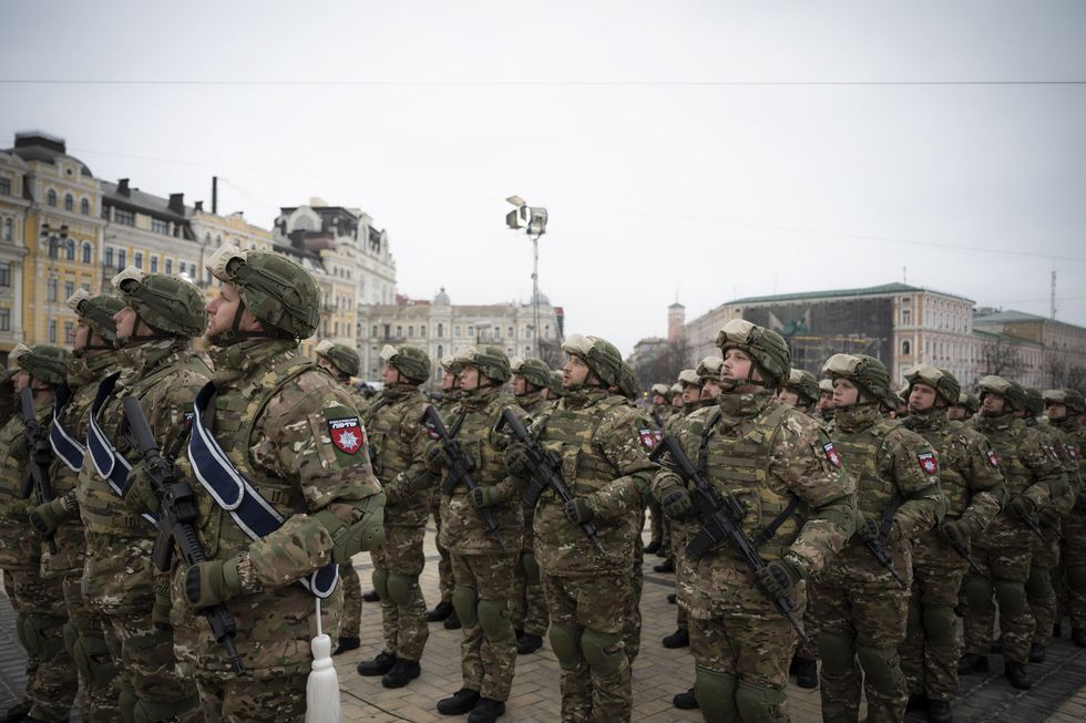 Photo of Ukrainian troops standing in Kyiv's St Sophia's Square in Feb. 2023
