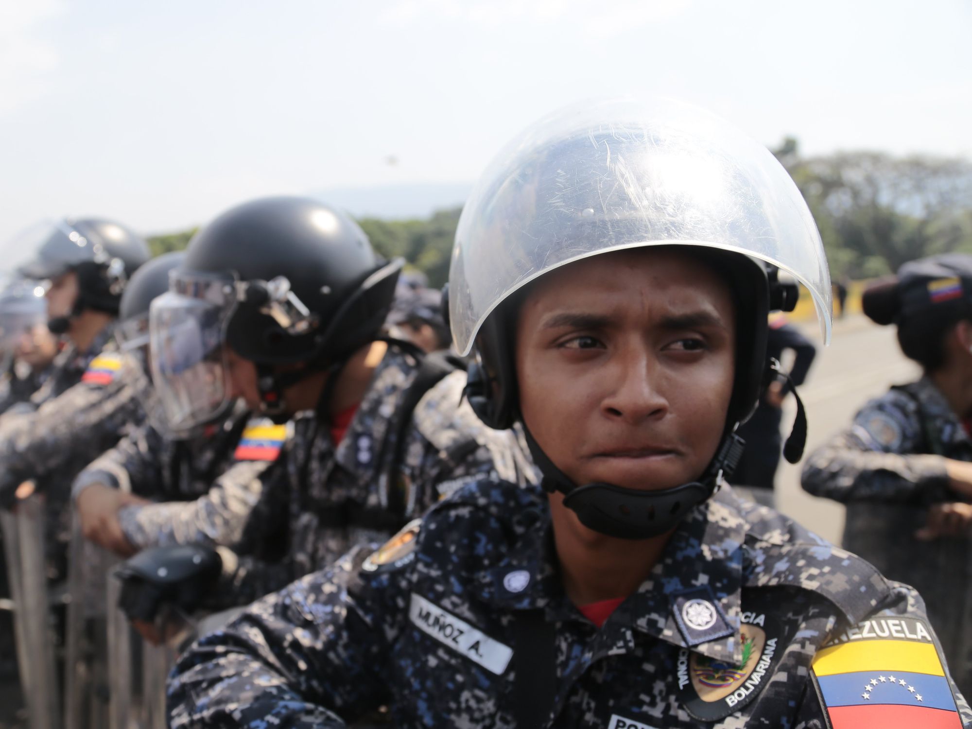 Photo of Venezuelan police with helmets and shields.