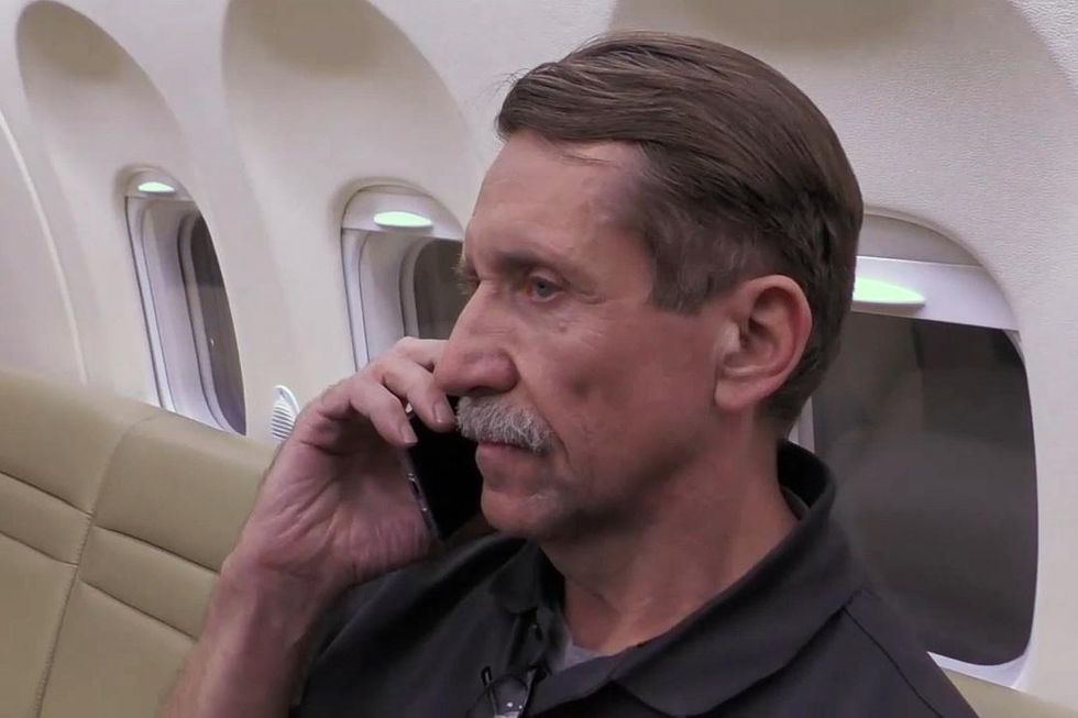 photo of viktor bout talking on a cell phone