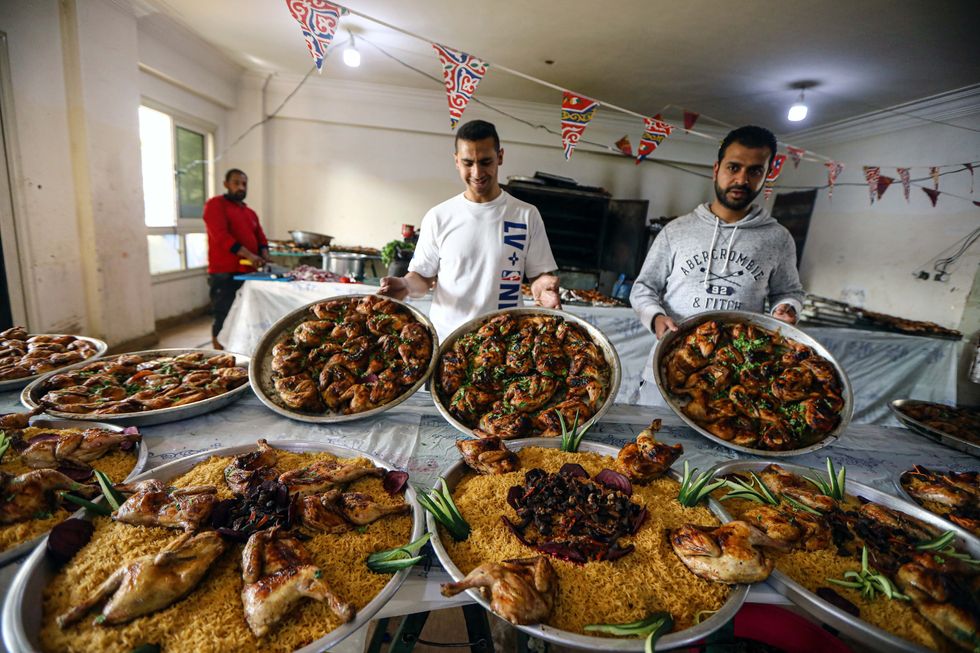 Photo of volunteers preparing iftar meals at Al-Rahman Kitchen in Cairo, Egypt