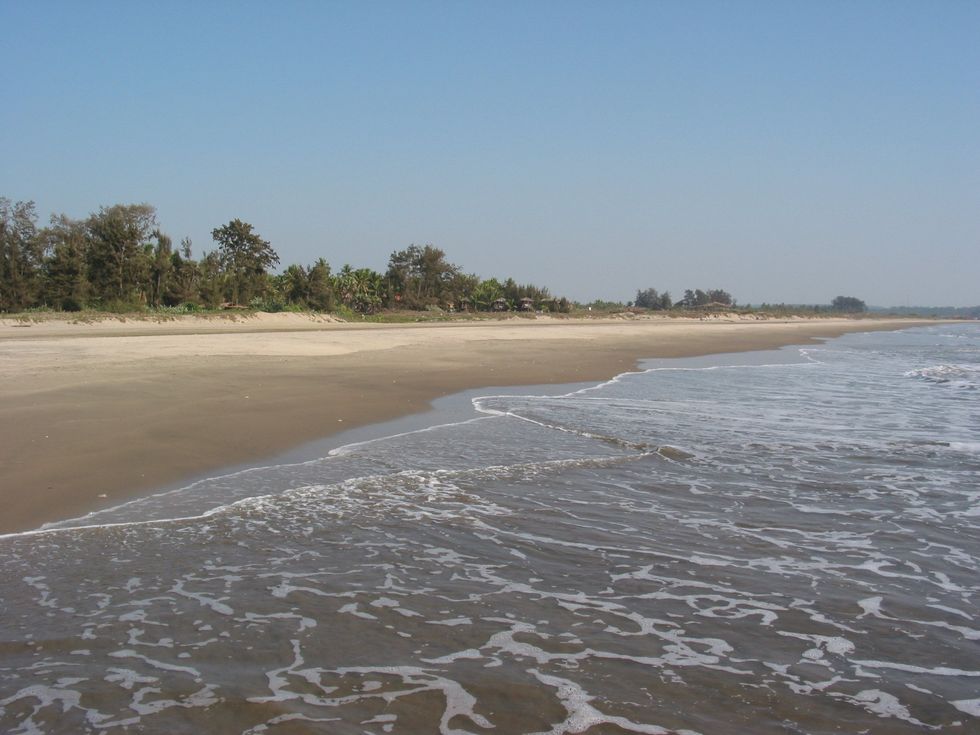photo of water coming into the shore.