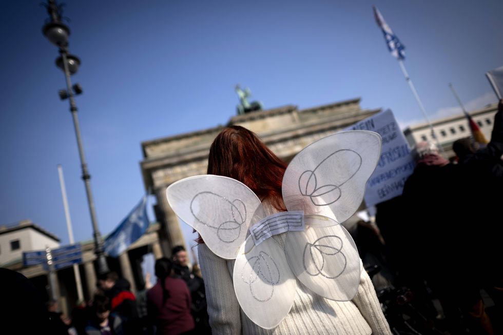 photo of woman dressed as angel