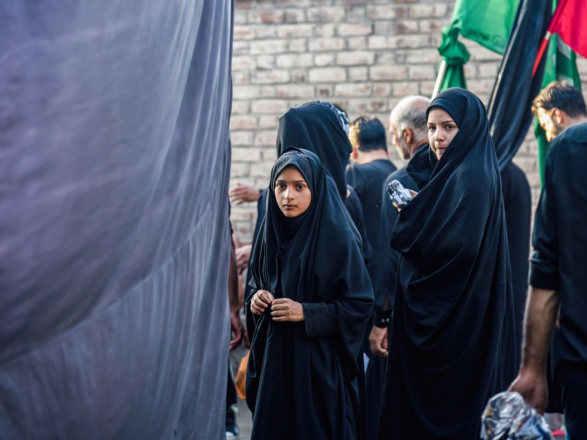 photo of women wearing hijabs during the Muharram procession in Srinagar, India