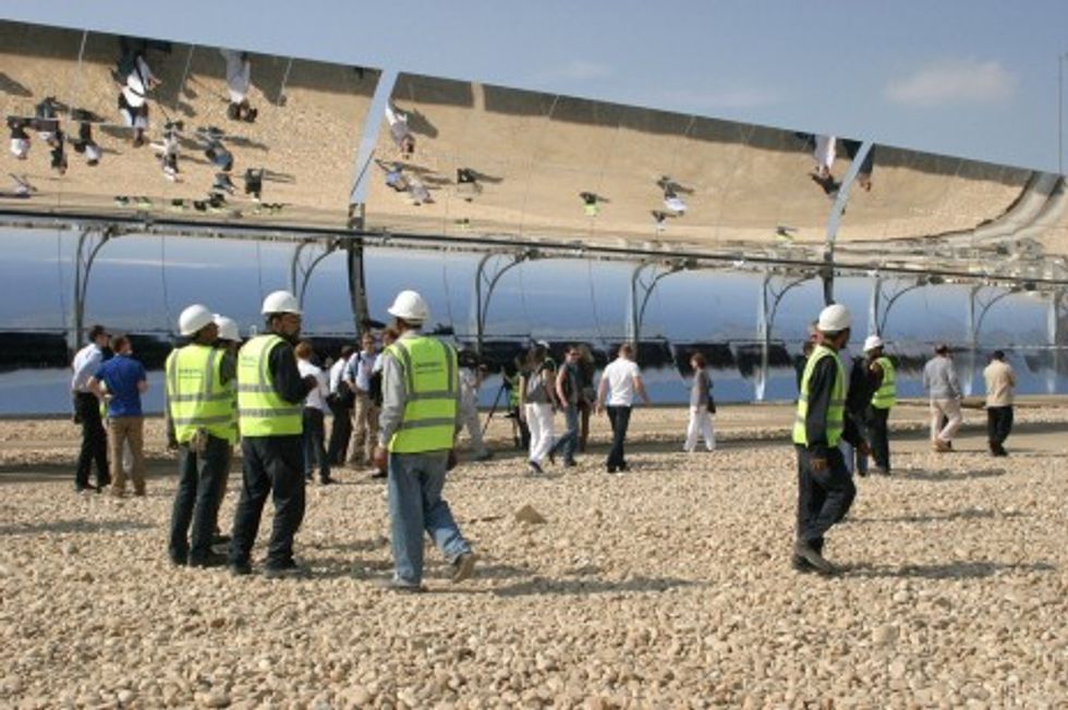 Photo of workers at a solar plant in Egypt