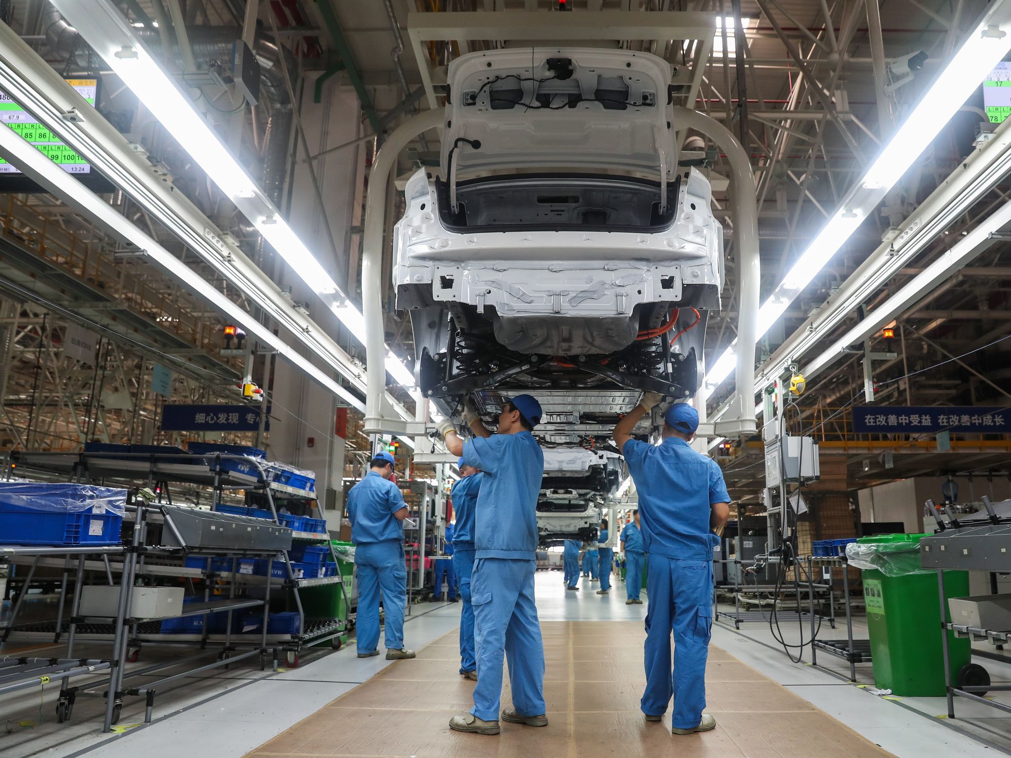 Photo of workers at the production line of SAIC Volkswagen in Shanghai