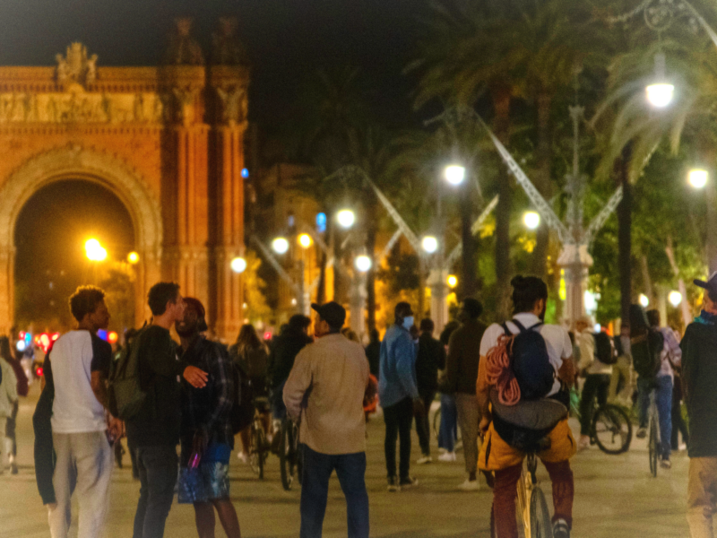 Photo of young men walking around in Barcelona, Spain