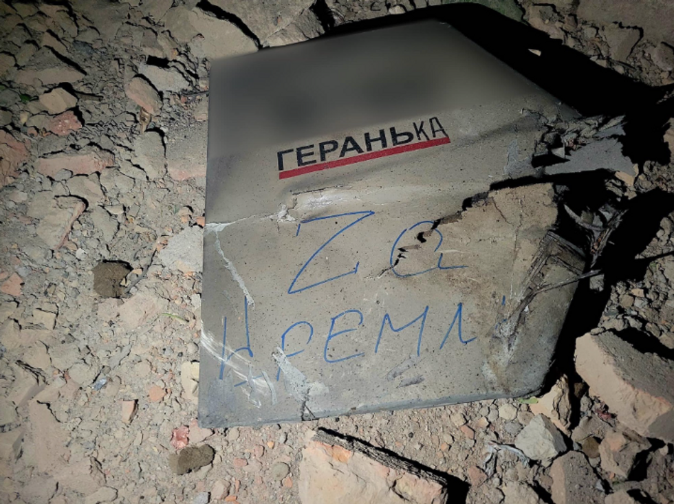 Photo provided by Ukraine's military showing parts of what it says is a downed Russian drone that reads "For the Kremlin."