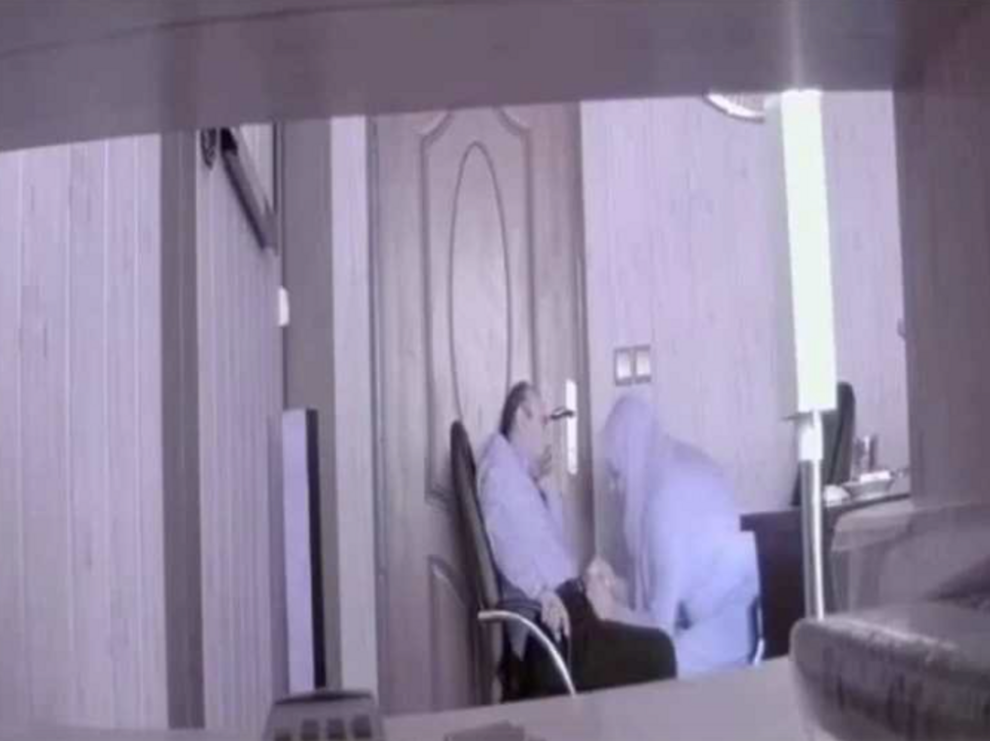 Photo purportedly showing a director of Iran's state broadcasting body in a "state of intimacy" with a female employee of the organization.
