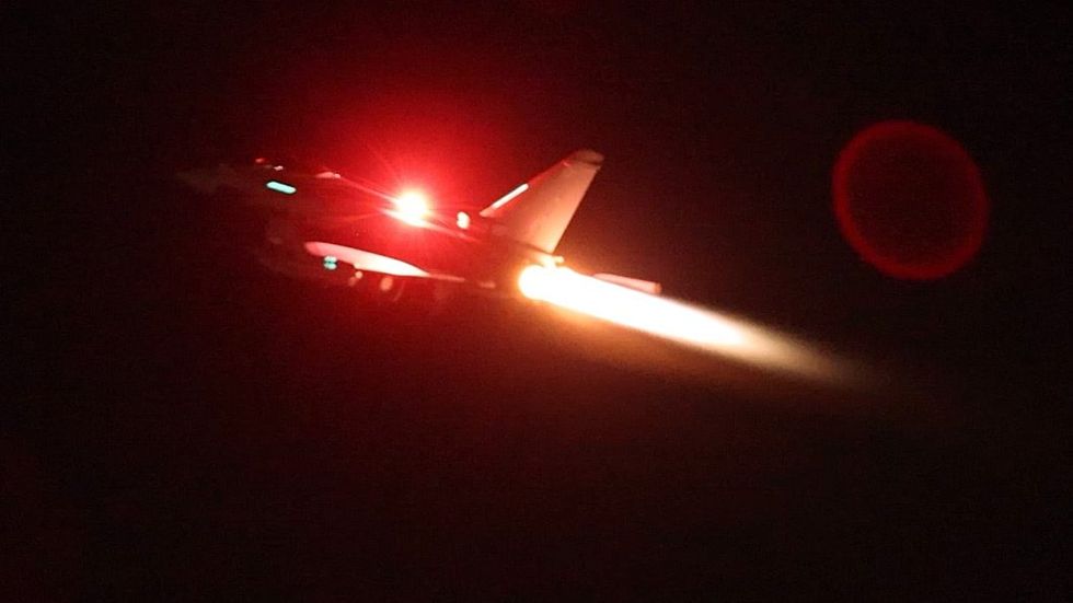 Photo showing a RAF Typhoon aircraft taking off to join a U.S.-led coalition to conduct airstrikes against military targets in Yemen on Jan. 11
