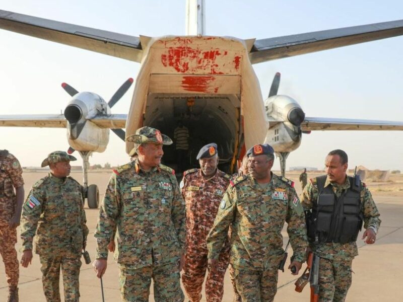 Photo showing General Commander of the Sudanese Armed Forces (SAF) Abdel Fattah Al-Burhan (L, front) arriving in Omdurman city, northwest of Sudan's capital Khartoum, on March 12