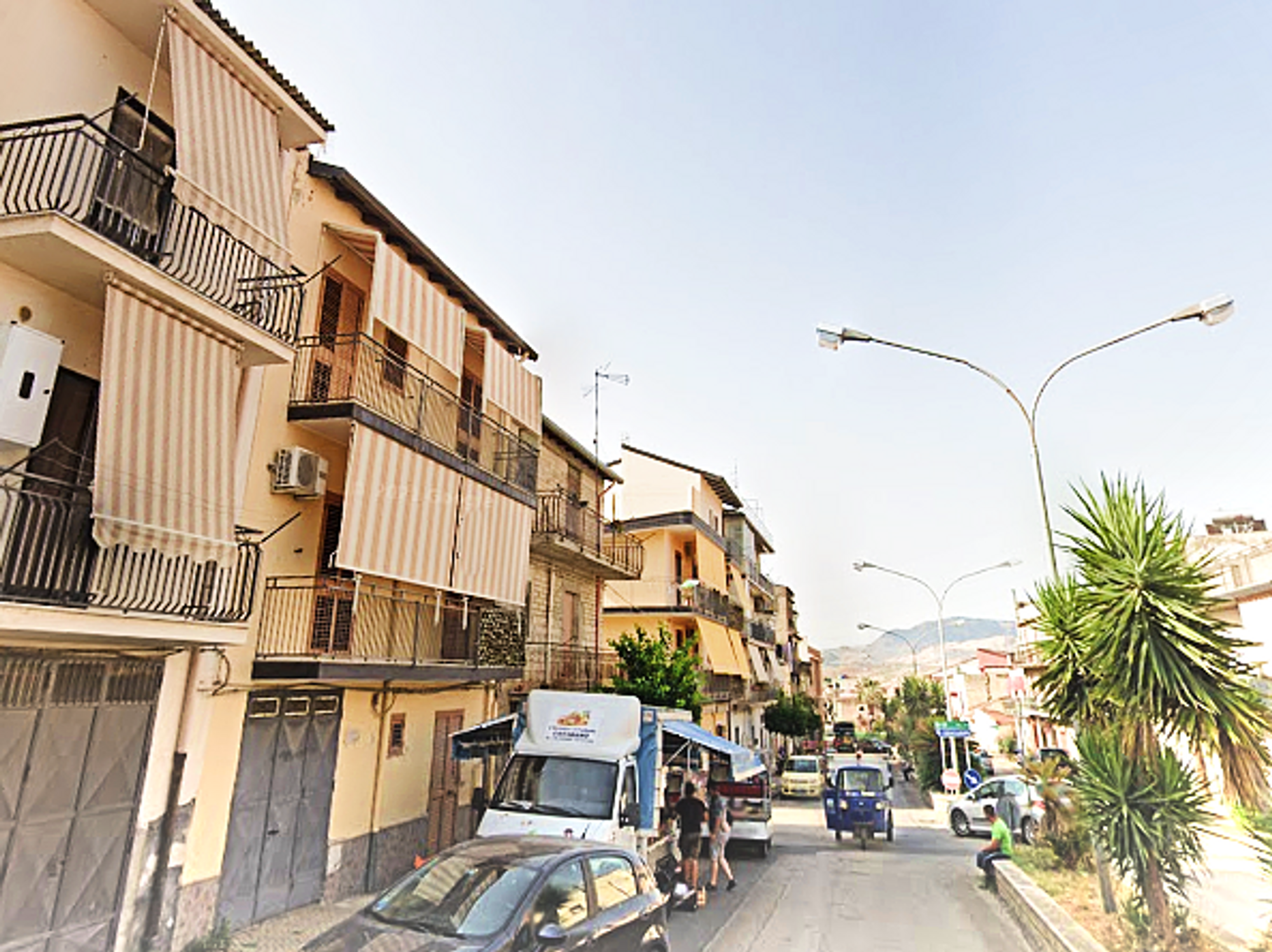 Photograph of a street in Catenanuova during the day