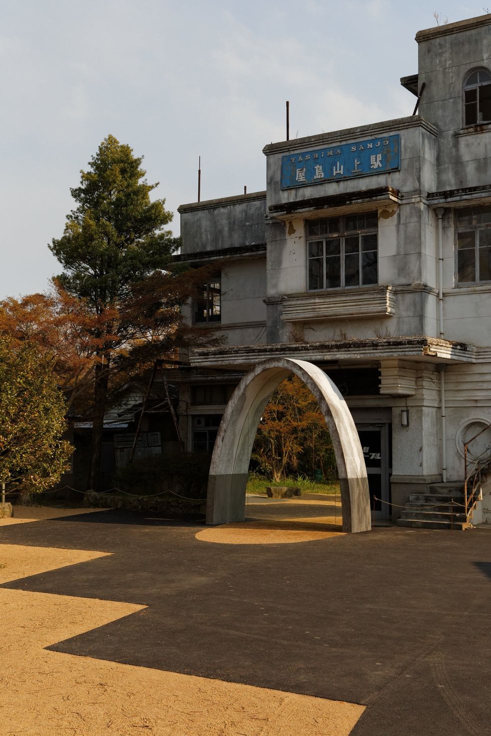 Photograph of an abandoned building facade in Yashima