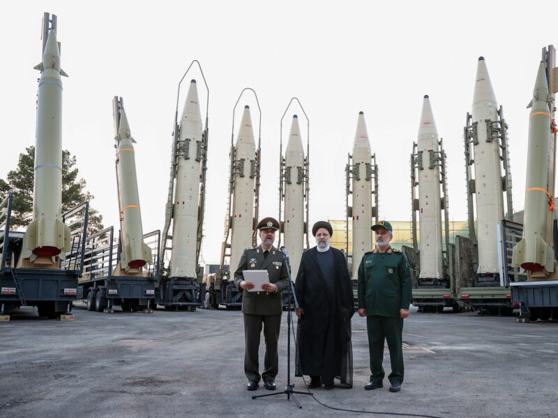 Photograph of Iranian President Ebrahim Raisi visiting an exhibit celebrating the achievements of the country's defence industry.