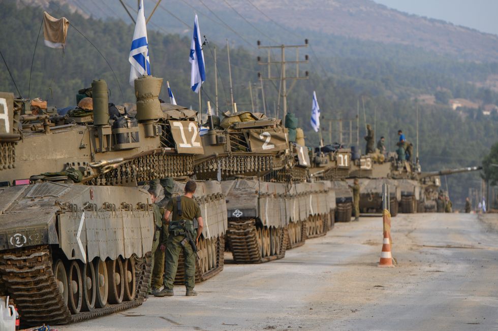 Photograph of Israeli tanks deployed in Upper Galilee of northern Israel.