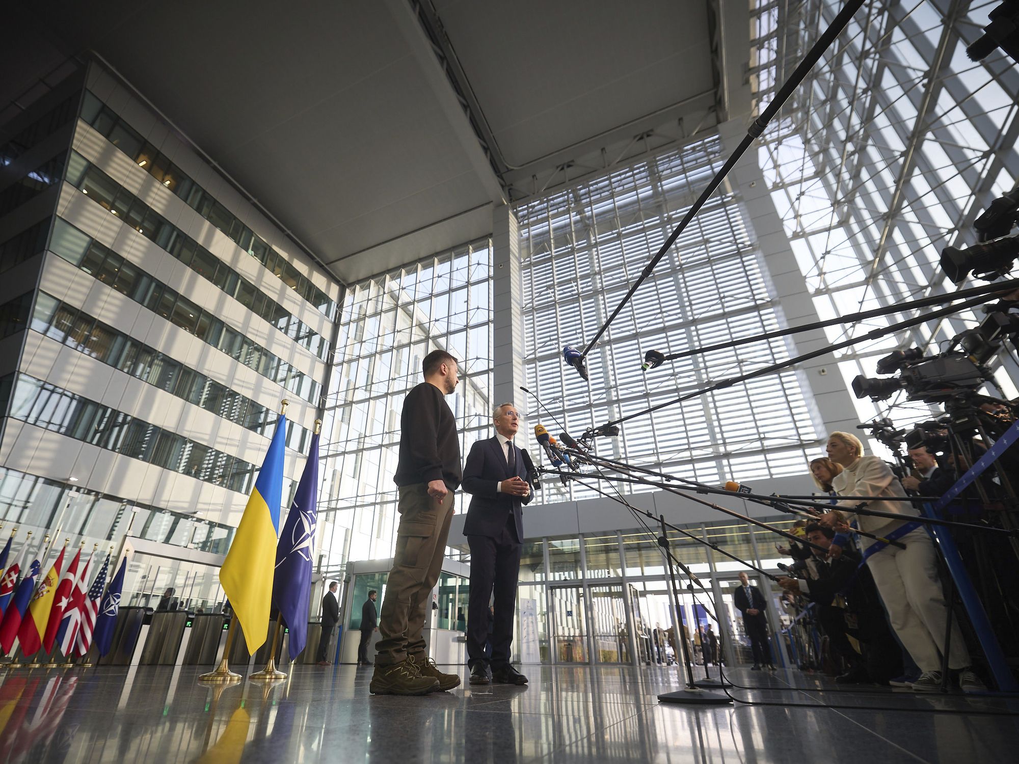 Photograph of NATO Secretary General Jens Stoltenberg, right, responds to a question during a joint press conference with Ukrainian President Volodymyr Zelenskyy
