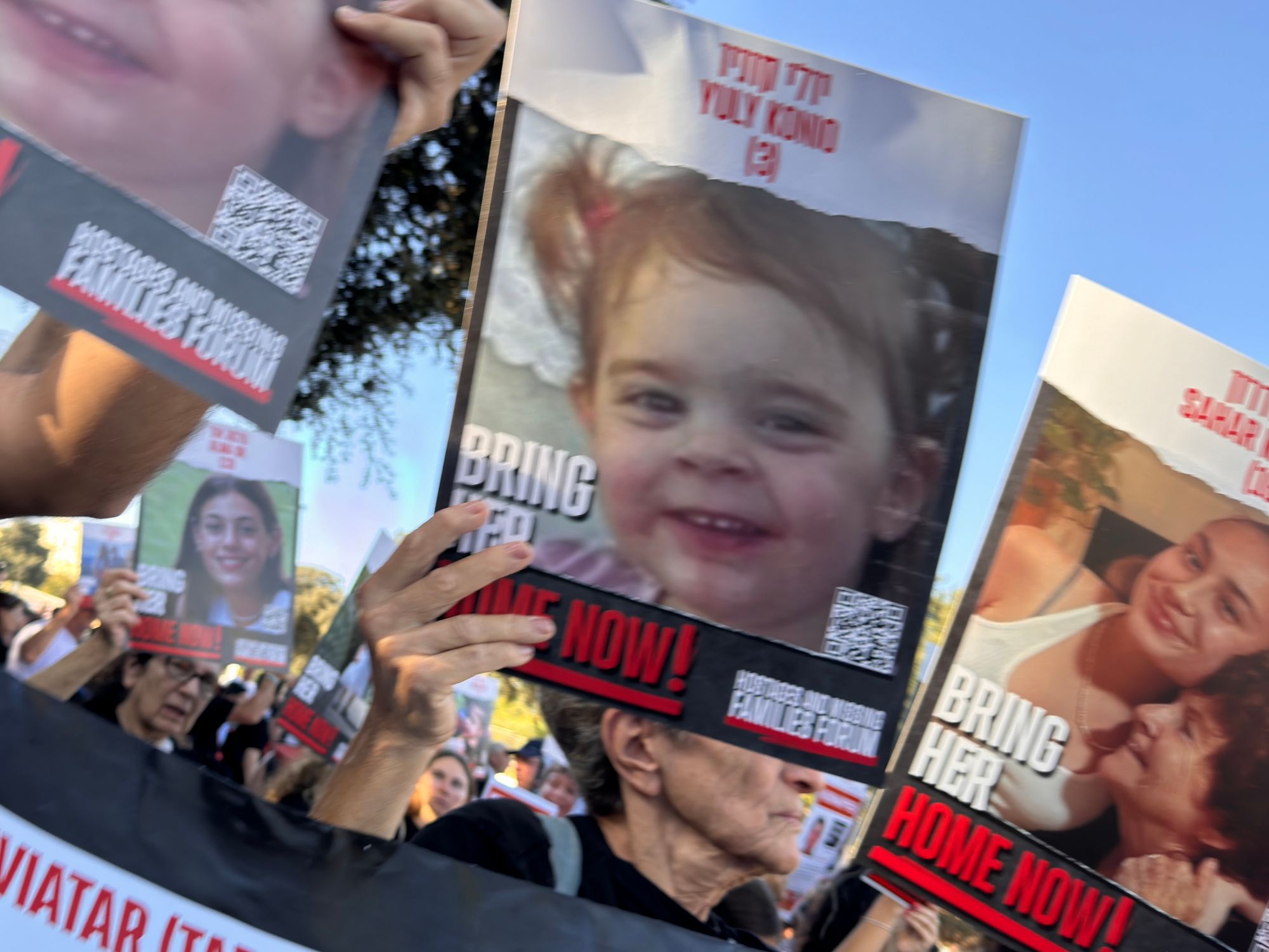 Photograph of posters depicting children and relatives that have been kidnapped by Hamas.
