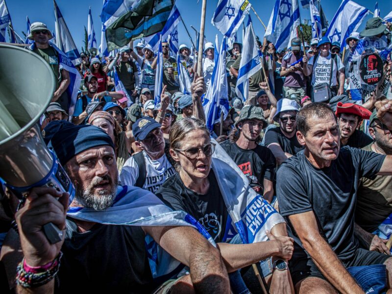 Photograph of protesters during an anti-judicial overhaul demonstration outside Jerusalem's Knesset.​