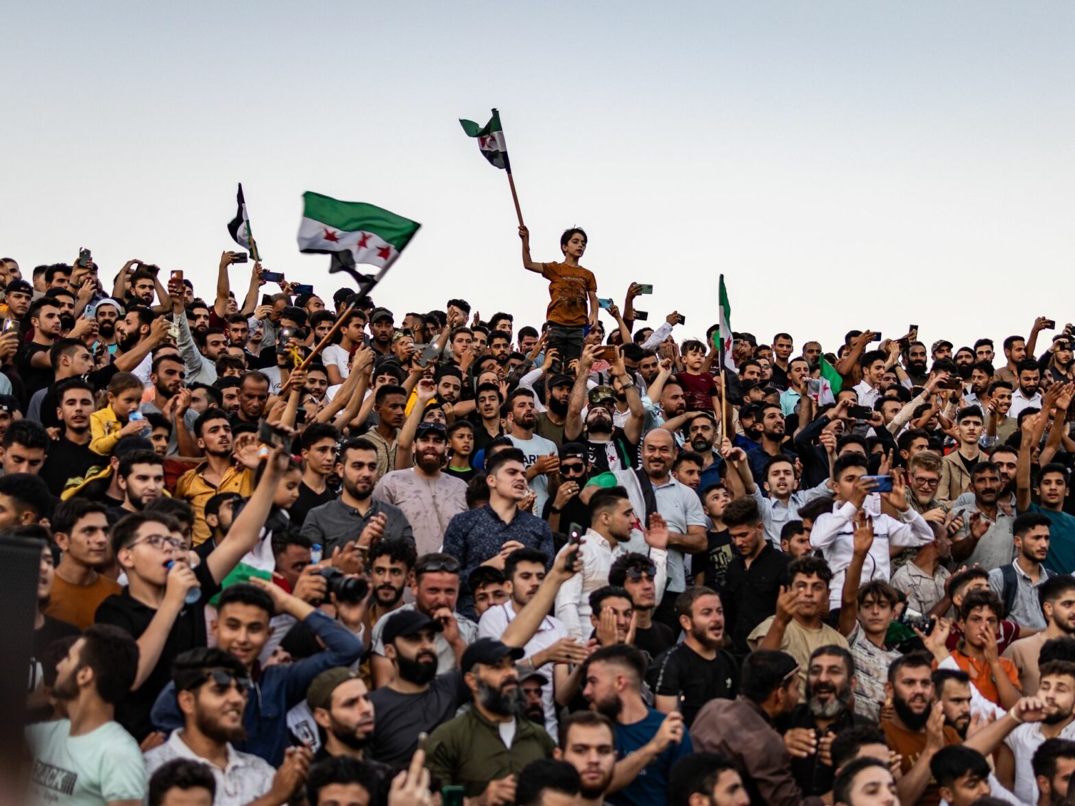 Photograph of Syrians taking part in a demonstration against the Syrian President Bashar al-Assad's regime