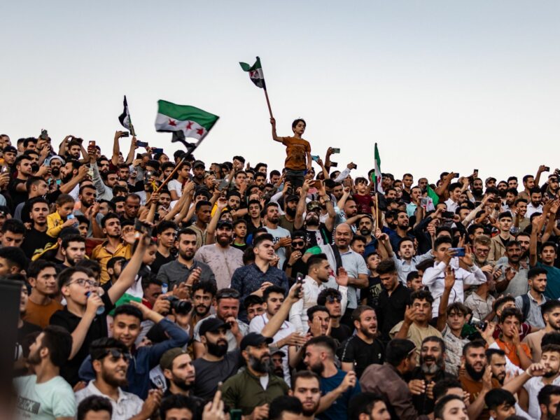 Photograph of Syrians taking part in a demonstration against the Syrian President Bashar al-Assad's regime