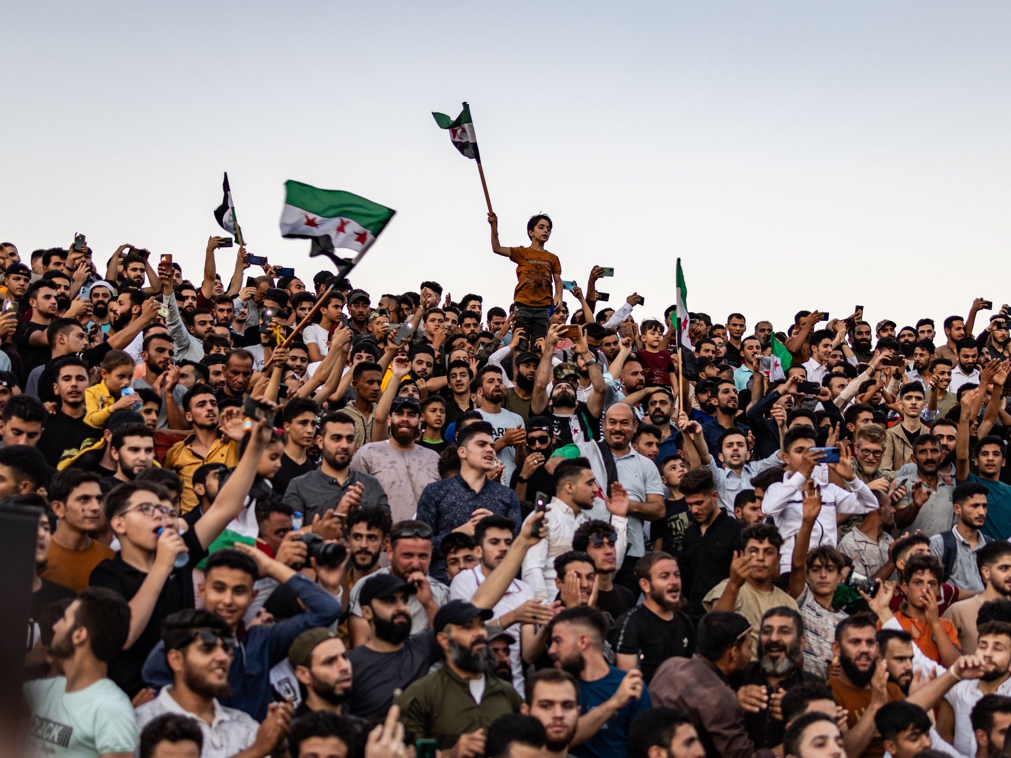 Photograph of Syrians taking part in a demonstration against the Syrian President Bashar al-Assad's regime