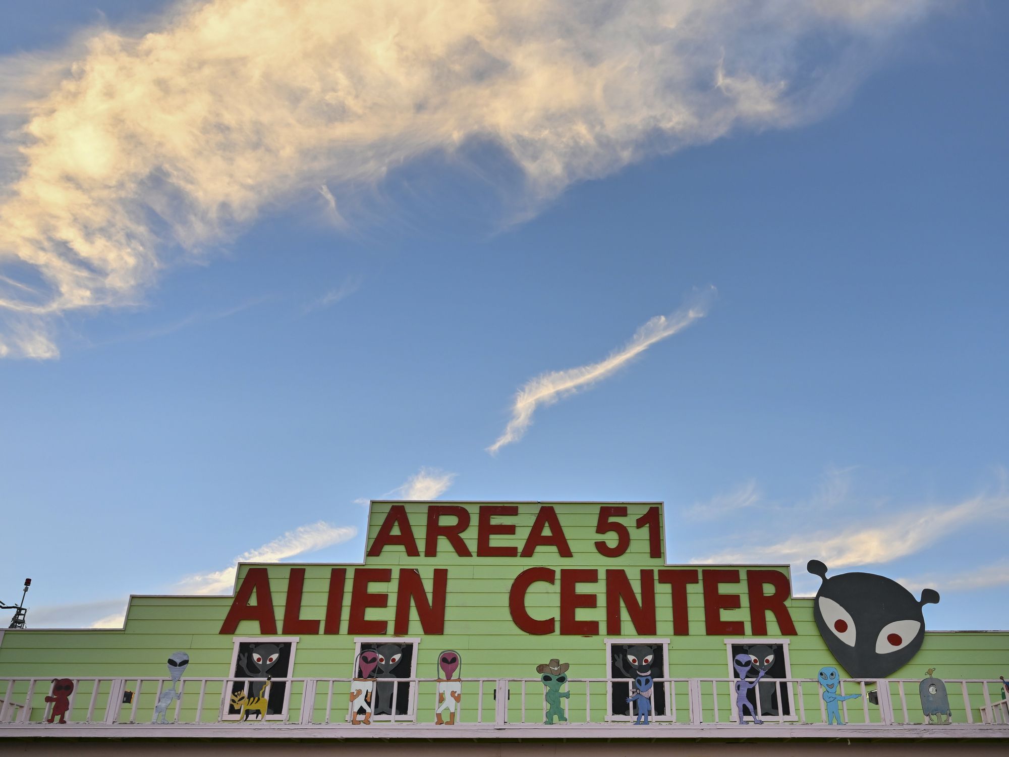 Photograph of the Area 51 Alien Center is seen at sunset on July 16, 2023, in Amagrosa Valley, Nevada.​ The roadside extraterrestrial-themed souvenir shop sits along U.S. Highway 95.