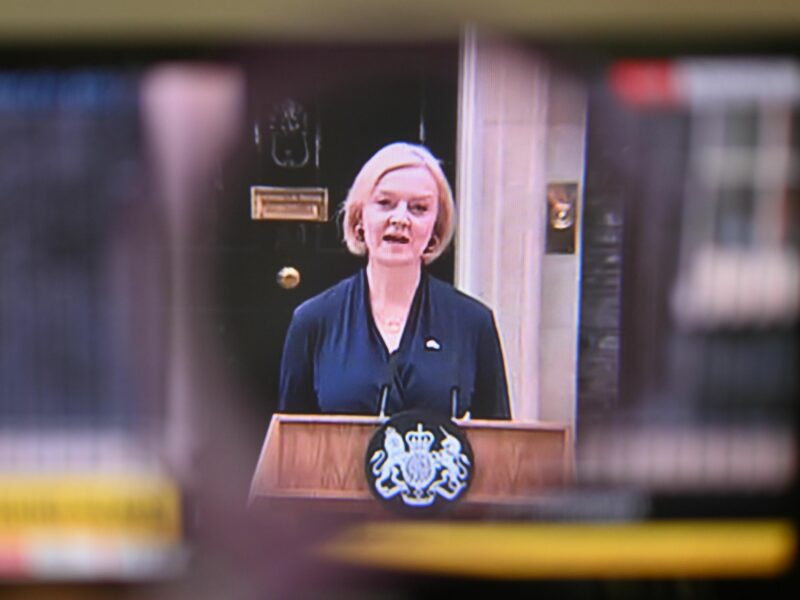 photography of a TV broadcast showing UK Prime Minister Liz Truss giving her resignation speech
