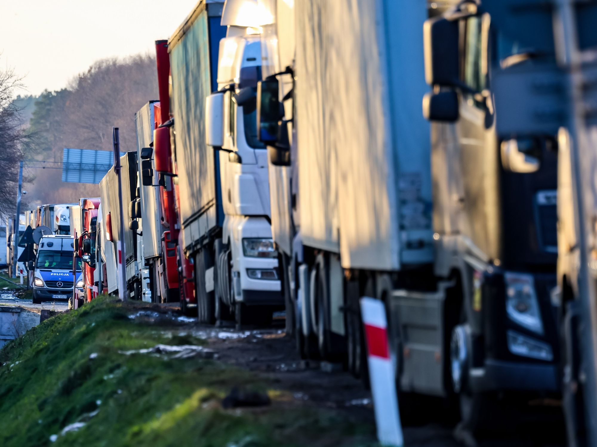 Photogrqph of a line of trucks queued in the Korczowa - border crossing​
