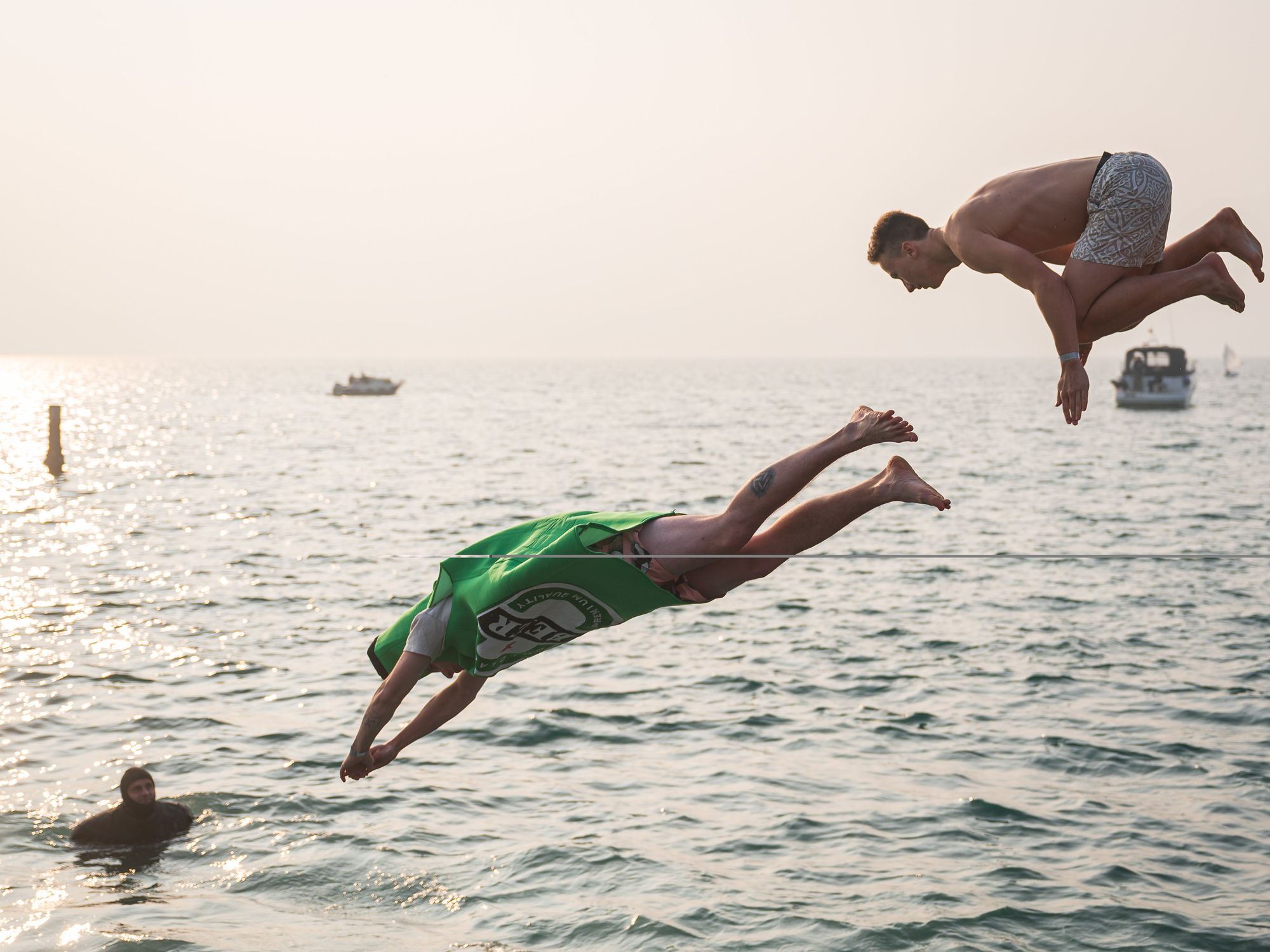 Photos Of The Week: Muan Airport Crash, Ukraine-Russia POW Swap, NYE Dive