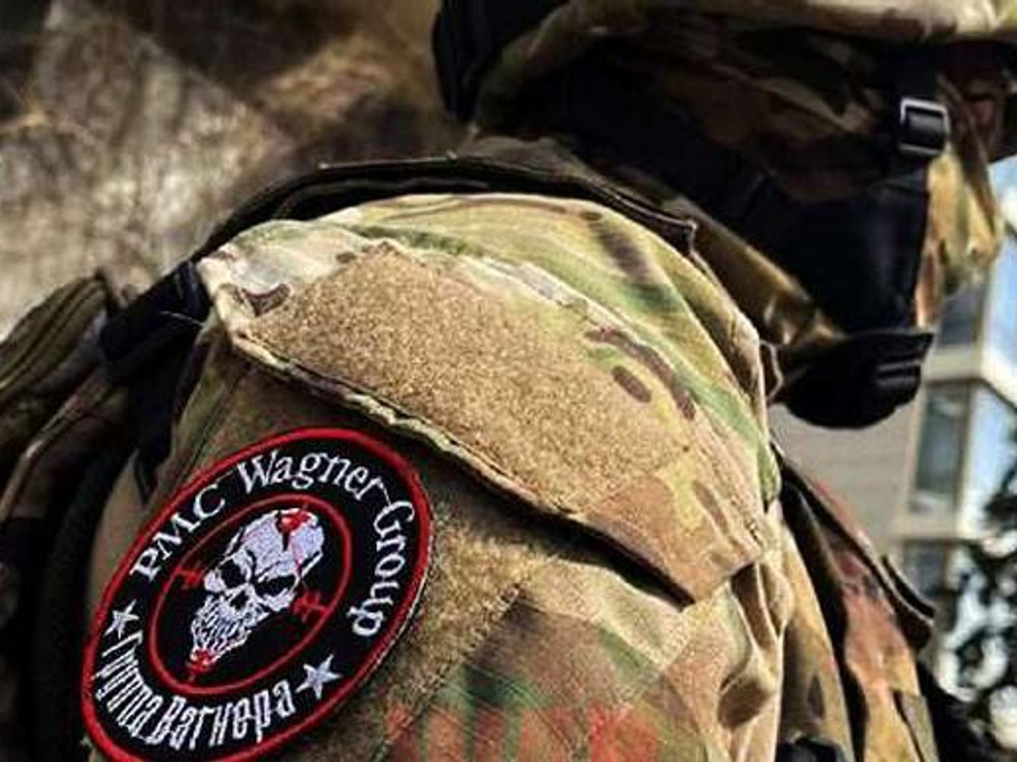 Picture of a soldier wearing the Wagner Group Logo on their uniform.