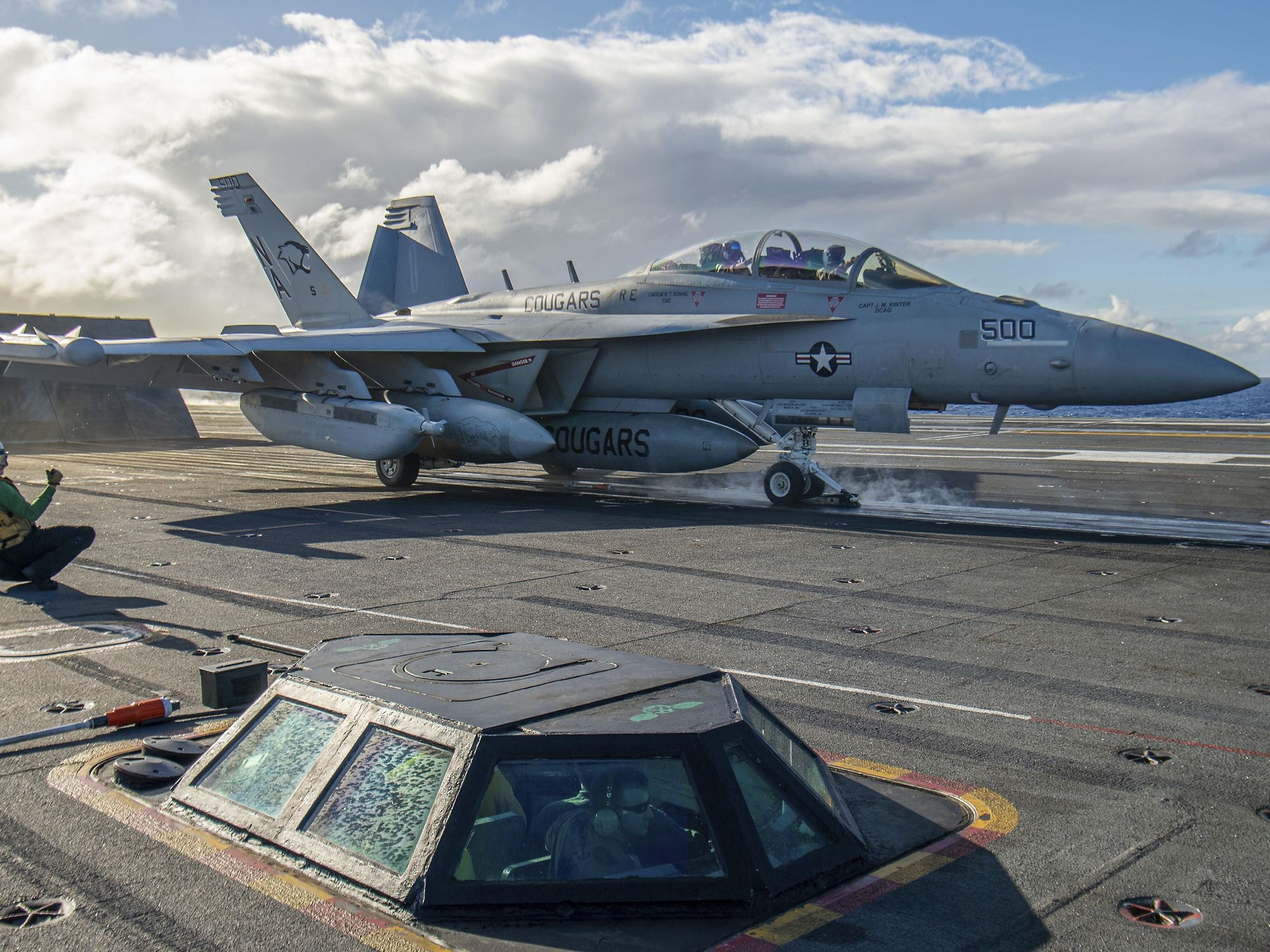 Picture of an American fighter jet about to be launched.