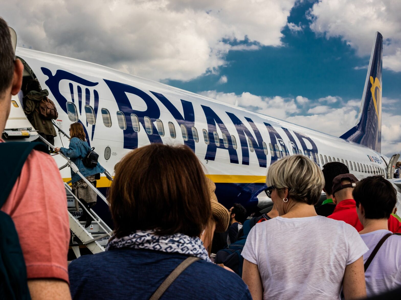 Picture of passengers entering a Ryanair aeroplane