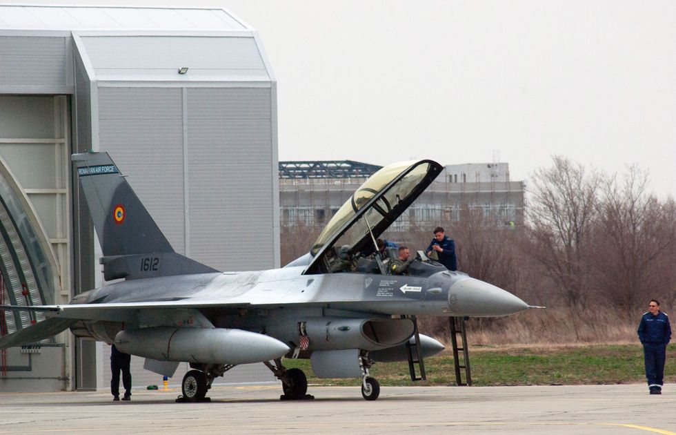 Pilots in the cockpit of an Air Force F-16 fighter jet at an air base in Borcea, Romania as part of a NATO air police exercise on March 6, 2024.