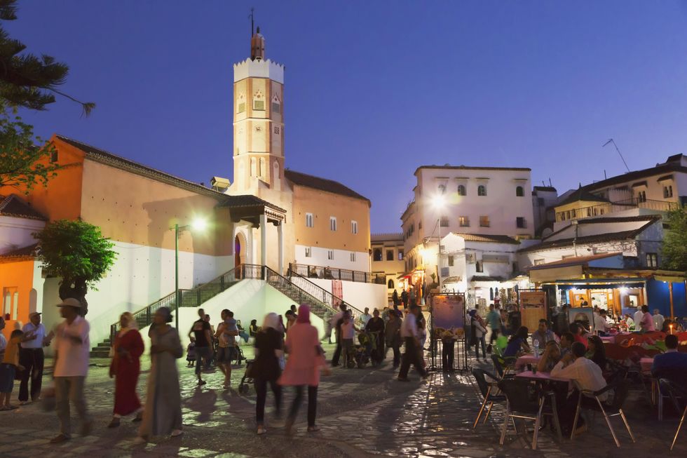 Place Outa El Hammam With The Great Mosque On The Left At Dusk; Chefchaouen Province Morocco