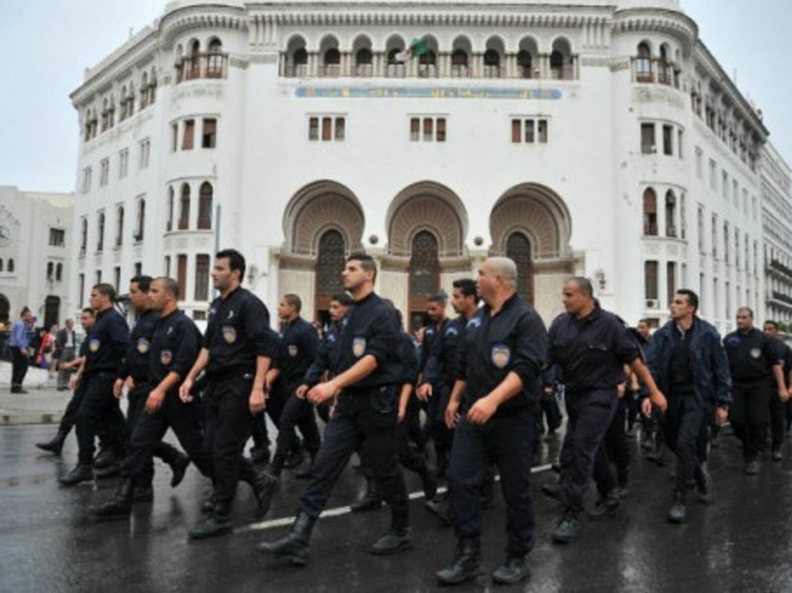 Police in Algiers earlier this month marching in protest.