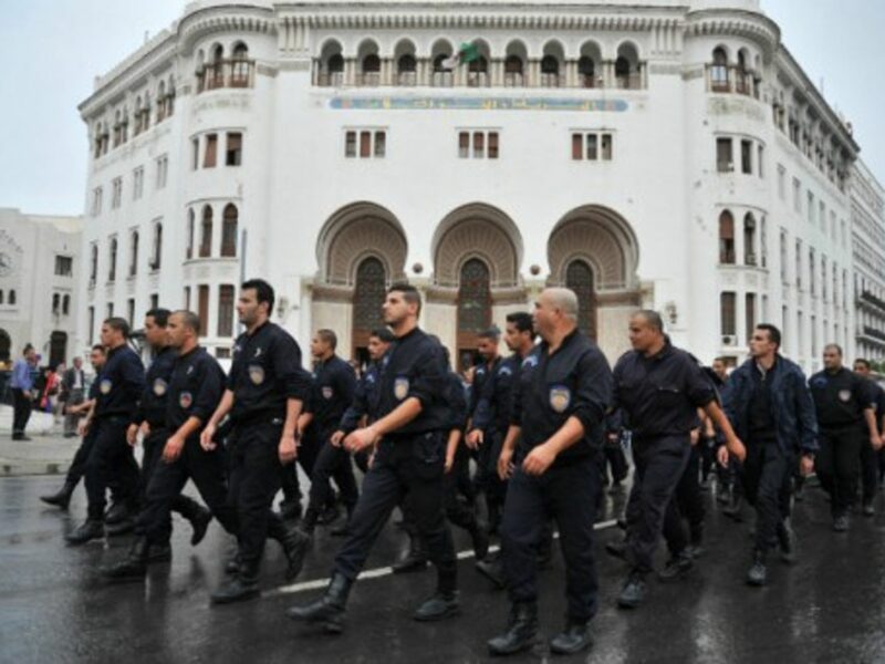 Police in Algiers earlier this month marching in protest.