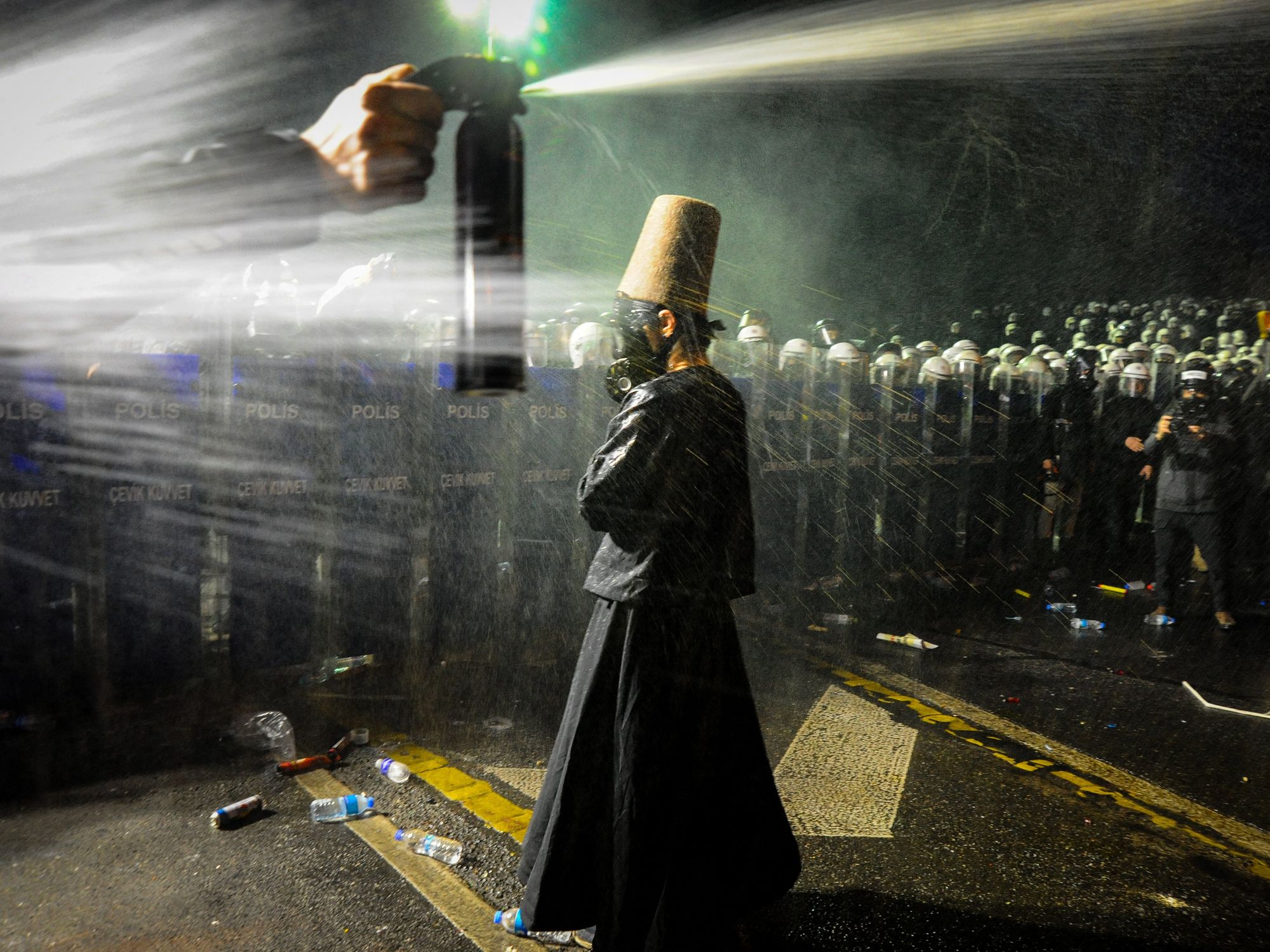 Photos Of The Week: Dervish Protester, Myanmar Quake, Pope Resurfaces