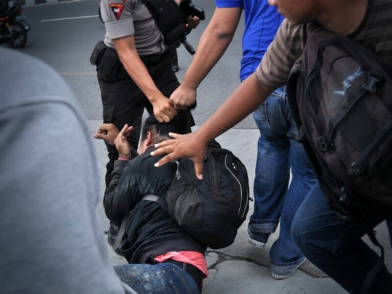 Police take down a demonstrator at a gay rights rally in Yogyakarta in February