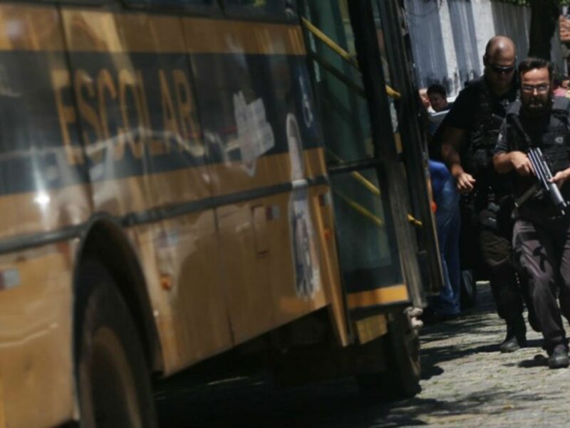 Policemen arrive at the school where a shooting occurred in Suzano city