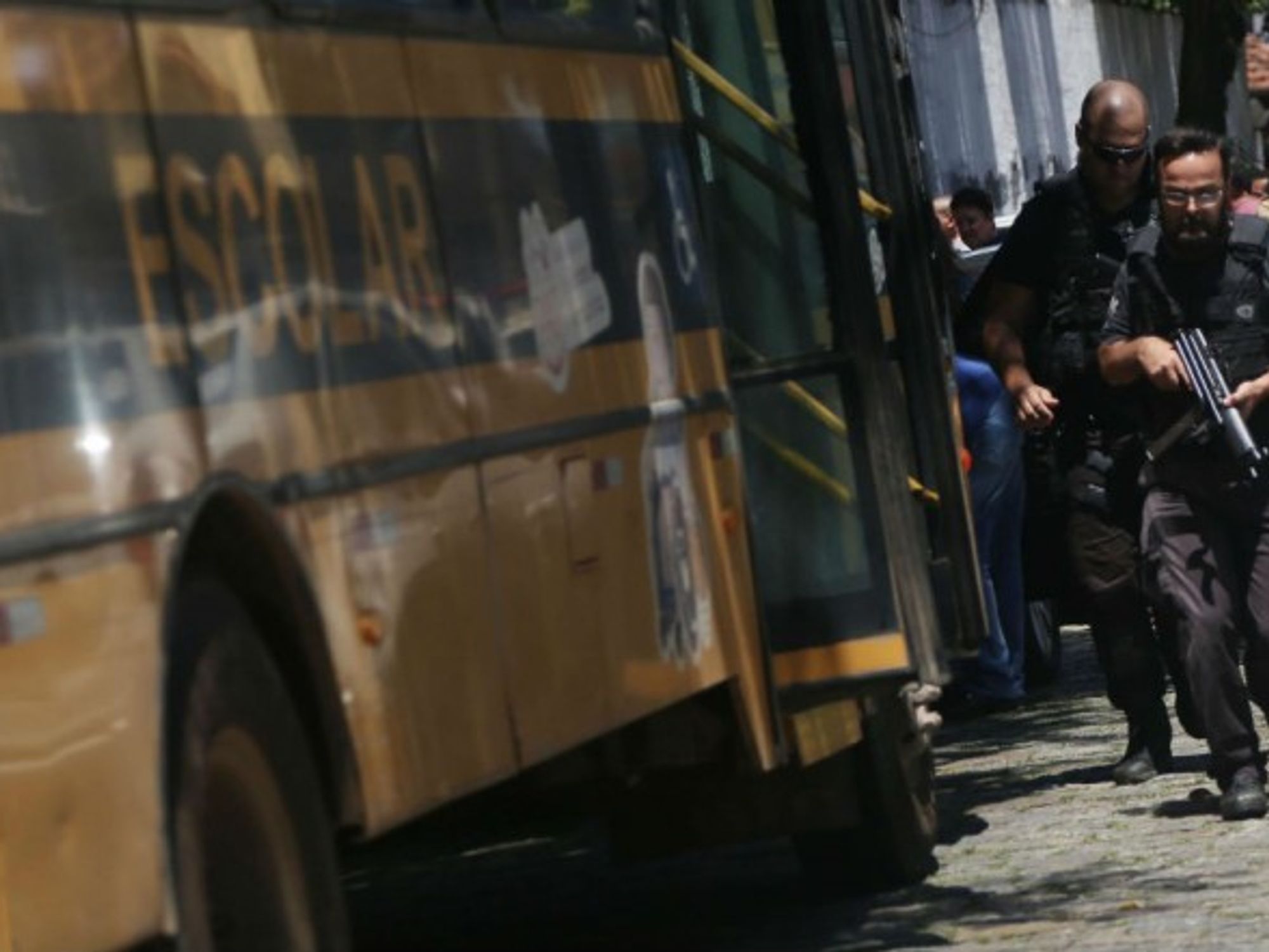 Policemen arrive at the school where a shooting occurred in Suzano city