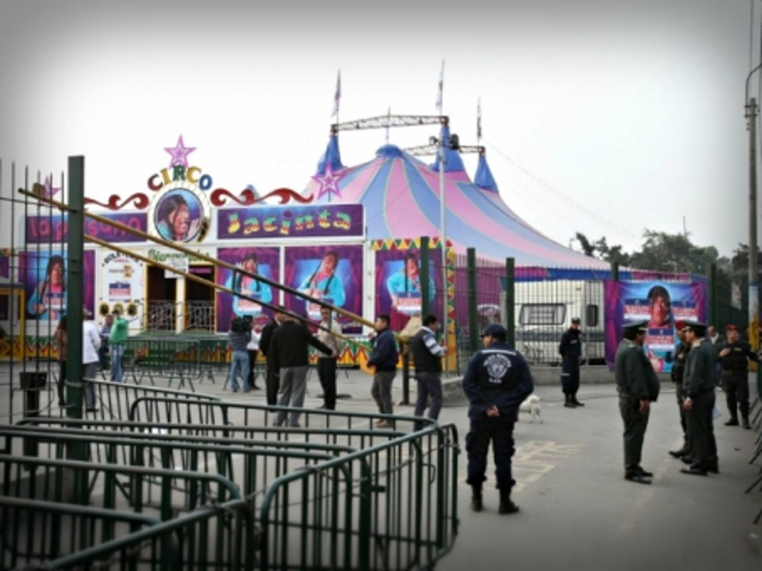 Policemen at work after the July 22 explosion in a Lima circus